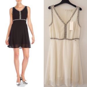 Gaudi white dress sleeveless.